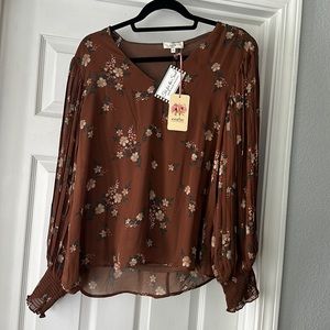 Women’s brown floral blouse
